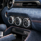 Illustration for article titled Placate Your Fears Of Global Economic Collapse With This Two-Tone Miata With A Denim Interior